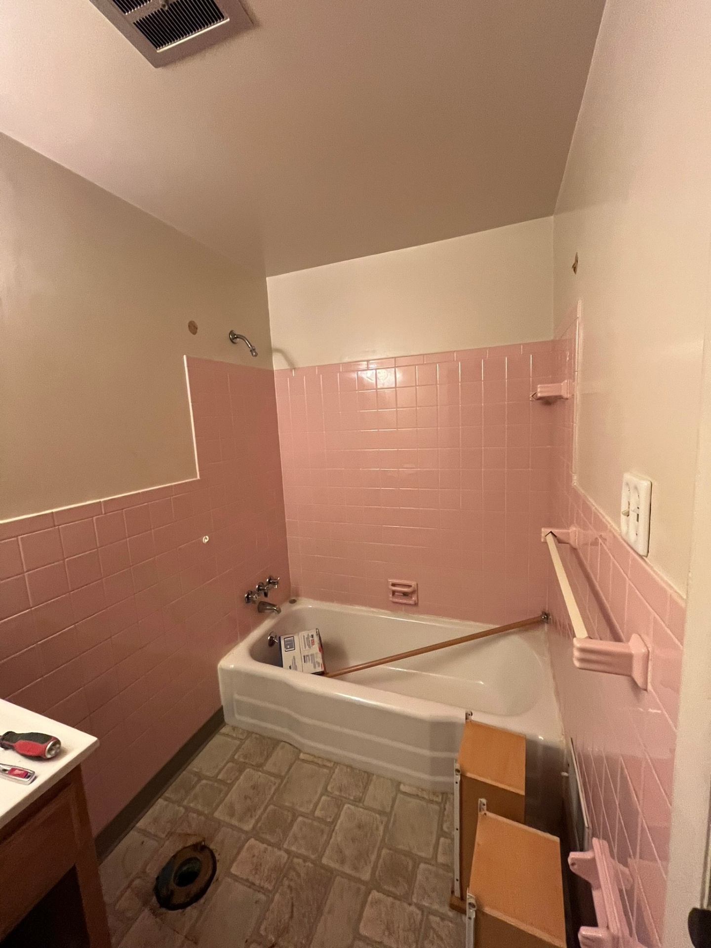 Before — Pink tile tub